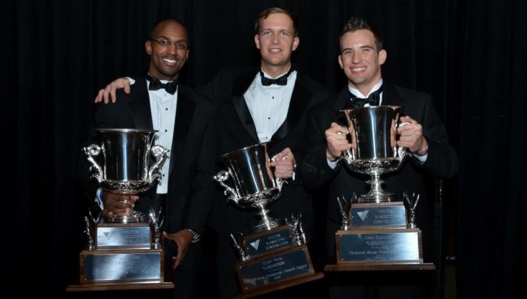 Greg Cothran, Tyler Park, Alex Dienner holding the Silver Cup Trophy as sales champions at Vector Marketing